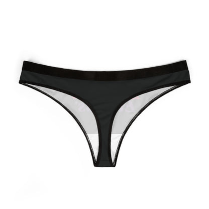 Sleek black thong panties with a subtle sheen, displaying the playful slogan 'Live Fast Eat Ass' in stylish fonts, embodying a blend of comfort and audacity.