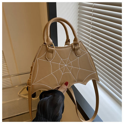 Halloween Spider Web Saddle Bag in beige, showcasing a trendy design with a striking spider web pattern, perfect for stylish celebrations this season.