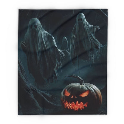 Decorative and Warm Halloween Spooky Arctic Fleece Blanket showcasing eerily floating ghosts and a sinister jack-o'-lantern, ideal for adding a luxurious touch to your Halloween décor.