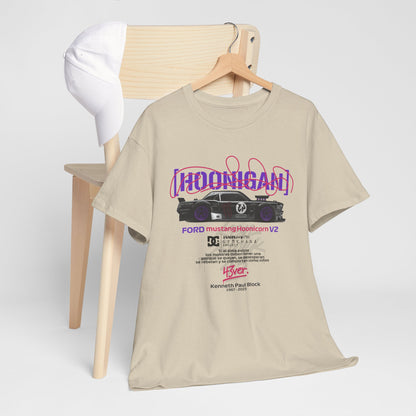 Sophisticated display of a Ford Mustang Hoonicon V2 graphic tee draped over a chair, alongside a white cap, embodying a perfect blend of style and motorsport passion.