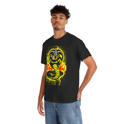 Stylish black Cobra Kai graphic tee featuring the iconic cobra design, modelled by a man, showcasing a blend of humour and martial arts elegance.