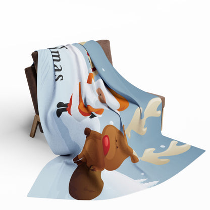 Decorative and Warm Christmas Arctic Fleece Blanket elegantly draped over a chair, featuring Santa and a reindeer design, an ideal companion for winter evenings and festive gatherings.