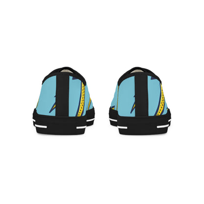 Close-up of the soft blue canvas and bold yellow lightning bolt design of Volt Manchester Men’s Lowtop Sneakers by Dazzling Dreams Studio, embodying luxe comfort and artistic expression.