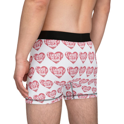 Side view of a model in Valentines Naughty Cheeky Mens Boxer Briefs highlighting the fun and cheeky message in a luxurious presentation.