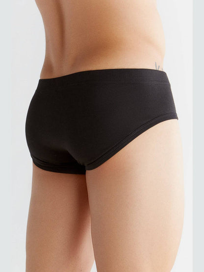 Luxury organic cotton briefs for men featuring a soft elastic waistband, embodying eco-friendly comfort and style.