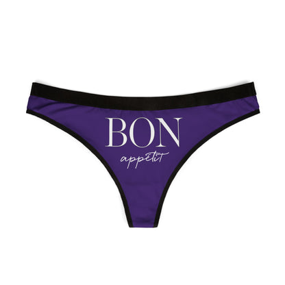 Chic purple thong featuring the whimsical phrase "BON appétit" in stylish font, perfect for adding a cheeky touch to intimate apparel.