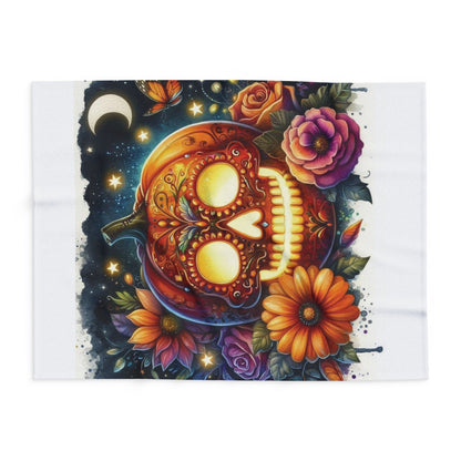 Artistic view of the Decorative and Warm Halloween Skellington Spooky Arctic Fleece Blanket displaying a stunning colourful pumpkin skull with floral details and celestial accents.