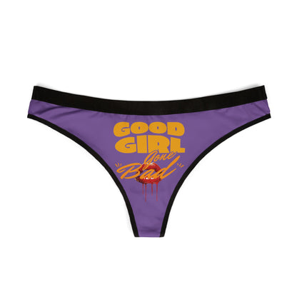 Stylish Good Girl Gone Bad thong panties displayed flat, featuring a striking purple background and playful typography, ideal for confidence-boosting lingerie.