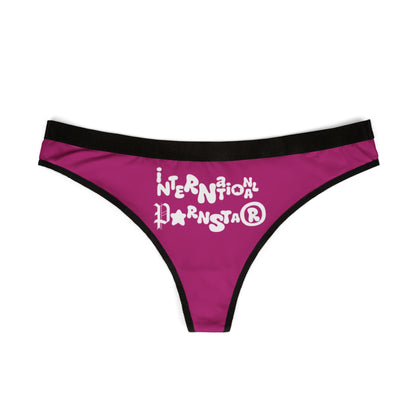Stylish International Star Thong in rich purple with striking white lettering, exhibiting a modern and cheeky design perfect for bold women.