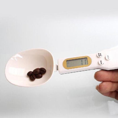 Digital measuring spoon with coffee beans displayed, emphasizing the functionality of the LCD Digital Kitchen Scale Electronic Cooking Food Weight Measuring Spoon Grams Coffee Tea Sugar Spoon Scale Kitchen Tools.