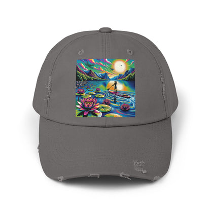 Unisex Distressed Paddleboarders Cap showcasing an artistic depiction of paddleboarding amidst picturesque nature, ideal for luxury beach outings.