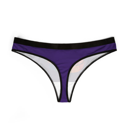Sophisticated women's thong displaying a bold rainbow lip motif on a plush purple background, merging humour with intimate allure.