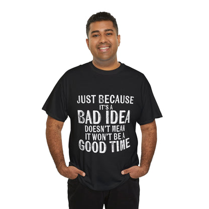 Luxury Unisex 'Just Because It's A Bad Idea' Cotton Tee worn by a smiling man, showcasing the striking graphic design that captures an adventurous spirit.