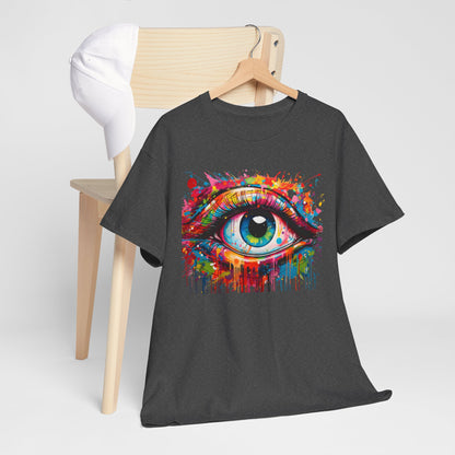 Visionary Drip Graphic Tee showcased with a stylish white cap on a wooden chair, presenting a vivid eye artwork with colourful paint splatters.