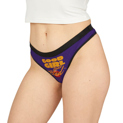 Sophisticated purple thong, featuring bold typography of 'Good Girl Gone Bad' for a statement piece in contemporary lingerie.