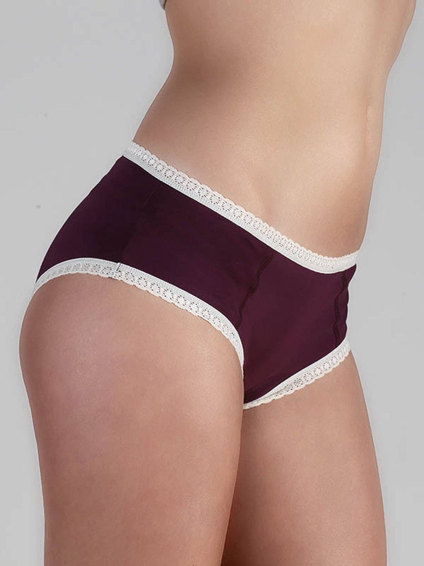 Close-up of soft elastic lace detailing on luxury organic cotton hipster briefs, highlighting the seamless blend of style and comfort.
