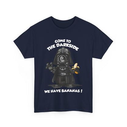 Front view of a navy T Shirt featuring a quirky Darth Vader graphic clutching a banana, with the phrase 'Come to the Darkside, We Have Bananas!'. This funny shirt merges Minions charm with sci-fi elements, making it a standout choice for casual wear.