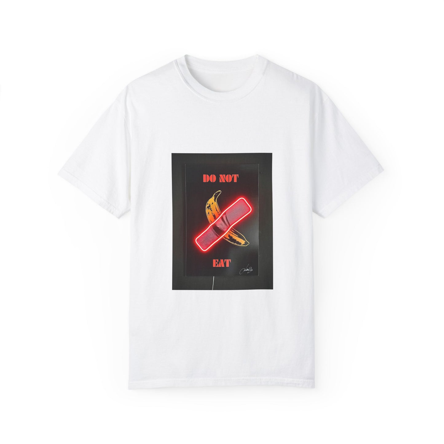 Luxurious Comfort Colors 1717 Unisex Garment-Dyed T-Shirt in white featuring a striking graphic print of a banana and a bold 'DO NOT EAT' message, perfect for statement casual wear.