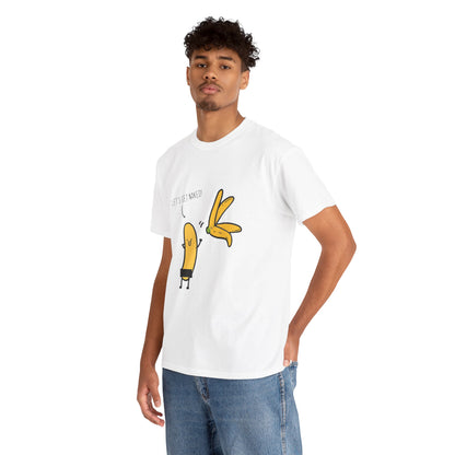 Chic male model showcasing a white graphic t-shirt emblazoned with 'LET'S GET NAKED!' surrounded by playful banana illustrations, epitomising urban luxury.