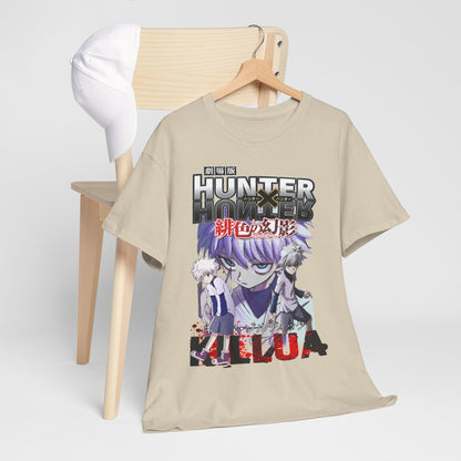 Stylish beige Hunter x Hunter T-shirt artistically draped on a chair with a complementary cap, showcasing the iconic characters Killua and Gon for discerning anime enthusiasts.
