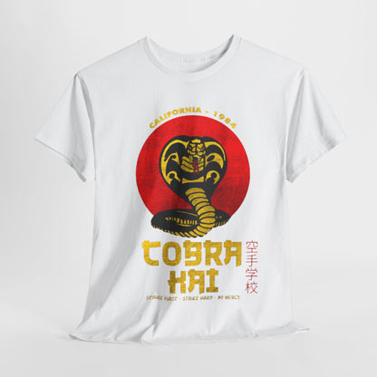 Elegant graphic t-shirt featuring the iconic Cobra Kai logo in bold colours on a pristine white background, embodying the spirit of martial arts and pop culture. This high-quality cotton tee promises comfort and style, perfect for enthusiasts and collectors alike.