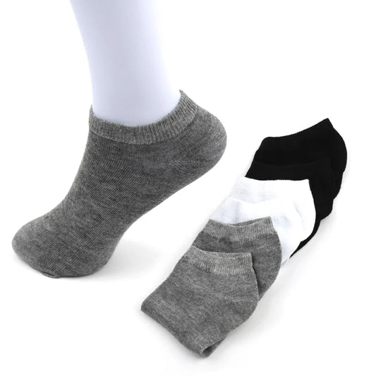 Elegant display of 5 Pairs Women's Breathable Sports Socks featuring a stylish grey sock on a feminine foot, perfect for active lifestyles and luxurious comfort.