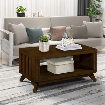 Chic walnut wood coffee table showcasing a minimalist design, featuring an open shelf for storage, placed in a contemporary living room with plush seating and vibrant greenery.