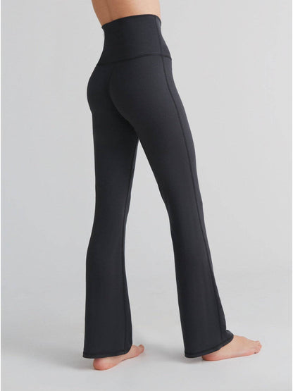 Luxury Tencel flared leggings for women, featuring a soft and stretchy fit, high waistband, perfect for versatile wear and comfort.