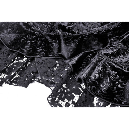 Side view of the Dark In Love velvet fishtail midi skirt highlighting the concealed zip fastening and dramatic silhouette.