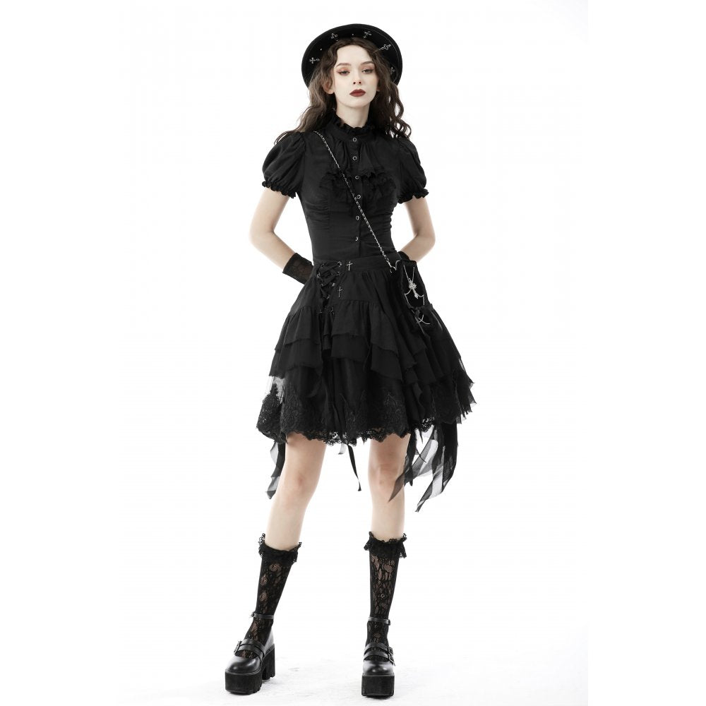 Model showcasing the Dark In Love Sinead fitted black blouse with puff sleeves, exemplifying luxury fashion and timeless style.