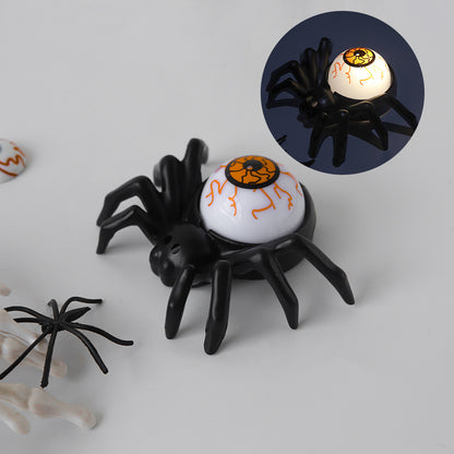 Halloween Spider Back Eye Beads displaying an elegant black spider with an orange eye, contributing to luxurious Halloween celebrations.