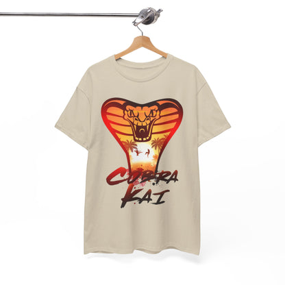 Sophisticated display of a Cobra Kai graphic t-shirt on a hanger, featuring a bold snake logo set against a stunning sunset, designed for fans of the series.