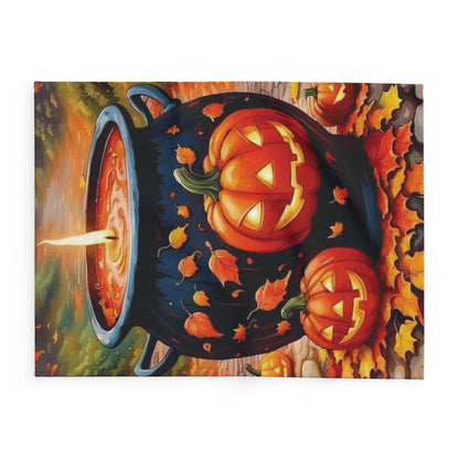 Artistic Decorative and Warm Halloween Spooky Arctic Fleece Blanket featuring a striking scene of a cauldron and cheerful pumpkins in a festive autumn atmosphere.