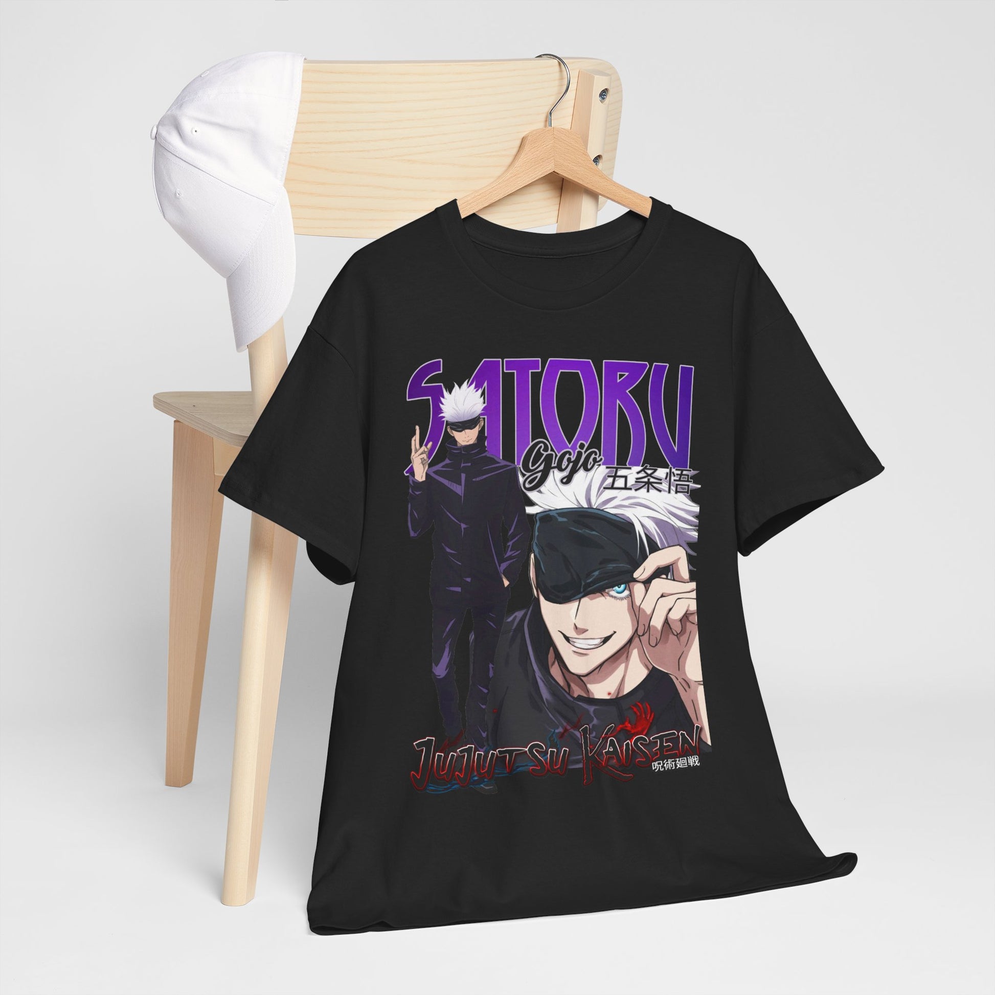 Refined Gojo Satoru graphic tee artistically styled on a wooden chair, exemplifying luxury in anime fashion with an eye-catching print from Jujutsu Kaisen.