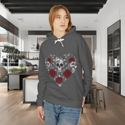 Model presenting the Unisex Lightweight Hooded Sweatshirt in dark grey, adorned with an exquisite skull and roses design in a contemporary kitchen setting.