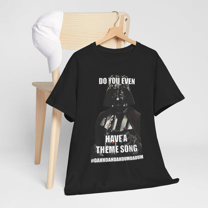 Darth Vader Star Wars unisex mens graphic cotton funny t-shirt featuring the phrase 'Do You Even Have a Theme Song?' in bold white text on a black background, elegantly displayed hanging on a wooden chair with a stylish white cap.