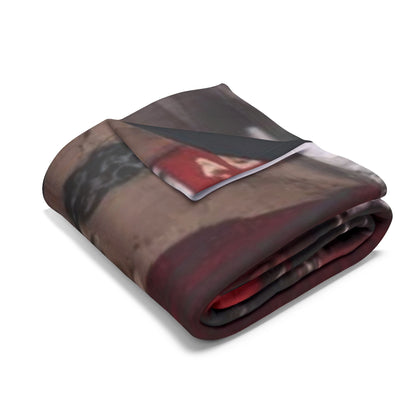 Elegant folded Arctic fleece blanket showcasing a haunting Halloween theme, ideal for cozying up during chilling autumn evenings.