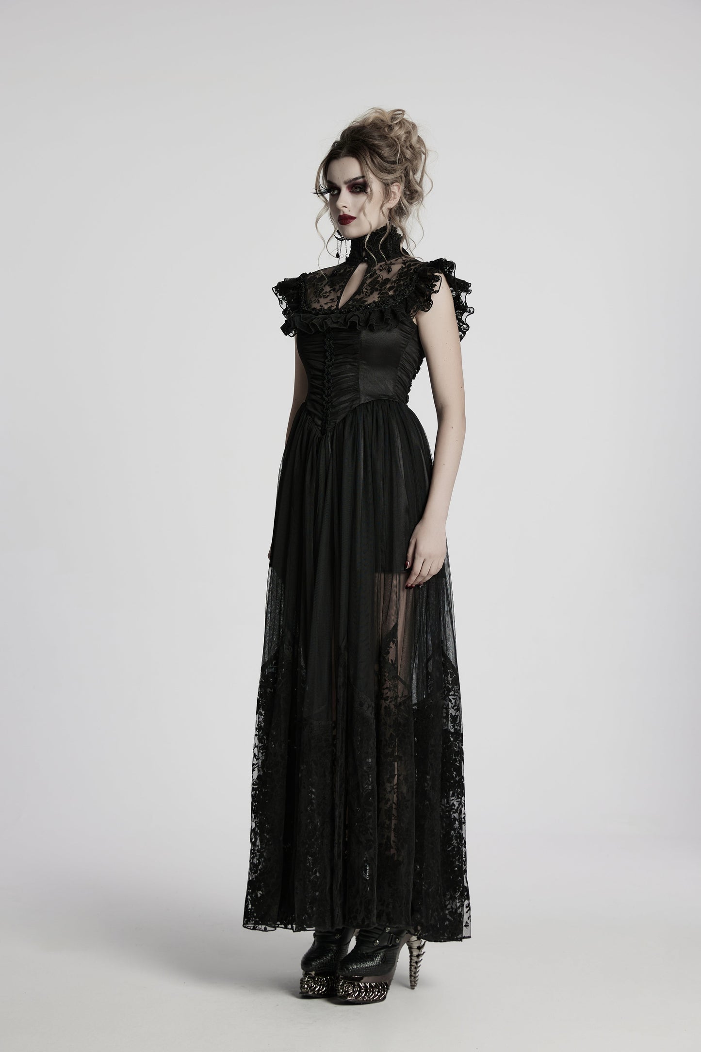 Flowing mesh skirt of the Seraphina dress in motion, featuring sheer overlay for an ethereal gothic look.