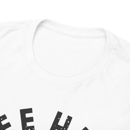 Close-up of the neckline of a stylish white t-shirt showcasing the 'FREE HUGS' print, emphasising the luxurious fabric and attention to detail.