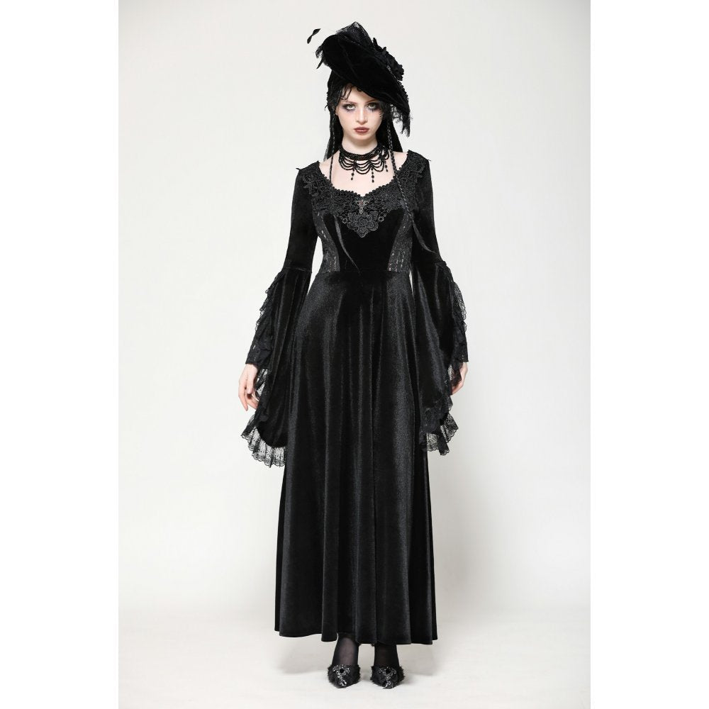 Elegantly styled model wearing Dark In Love Petricka Velvet Maxi Dress with oversized bell sleeves and lace trim, embodying gothic romantic fashion.