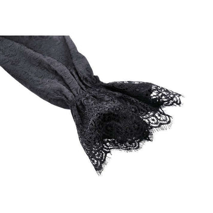 Model wearing the Felicity Gothic Tailcoat Shirt, exuding confidence in luxurious gothic fashion with high collar and stunning sheer panel.