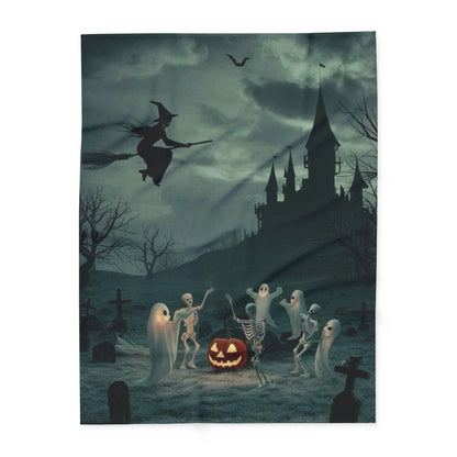 Sophisticated decorative and warm Halloween Arctic fleece blanket displaying a whimsical assembly of ghosts and skeletons around a jack-o'-lantern, set in a mystical graveyard scene, perfect for seasonal style.