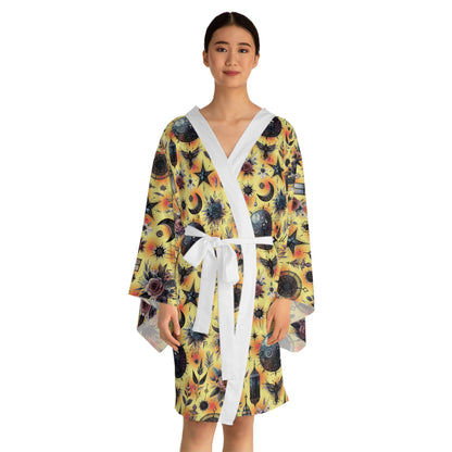 A model wearing the Floral Kimono Robe, elegantly styled with a white sash, highlighting its beautiful floral and celestial pattern for luxurious comfort.