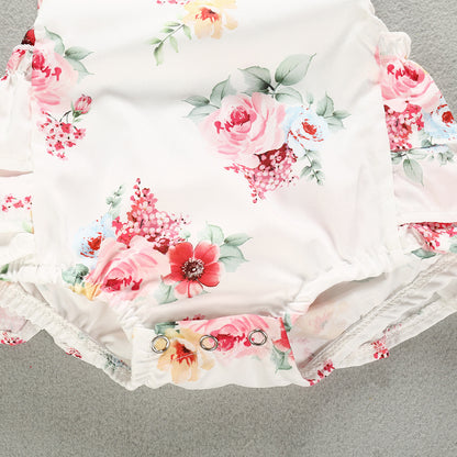 Detail of the bottom closure of the Luxurious 100% Cotton Floral Romper for Baby Girls, showcasing snap buttons for easy dressing and comfort for summer wear.