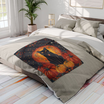 Chic Decorative and Warm Halloween Spooky Arctic Fleece Blanket adorns a beautifully made bed, showcasing a mystical black cat with pumpkins in a seasonal motif.