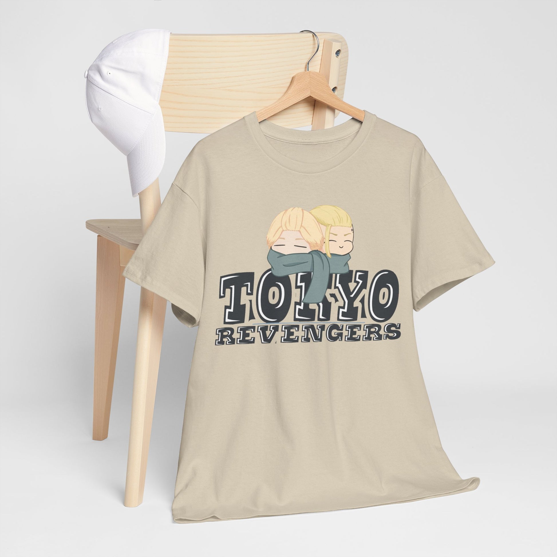 Sophisticated Tokyo Revengers anime t-shirt styled with a cap on a chair, epitomizing trendy streetwear aesthetics.