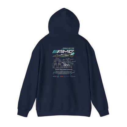 Elegant navy blue hoodie featuring intricate Mercedes AMG Petronas Formula One design on the back, showcasing a striking race car graphic and iconic logos, perfect for motorsport enthusiasts.