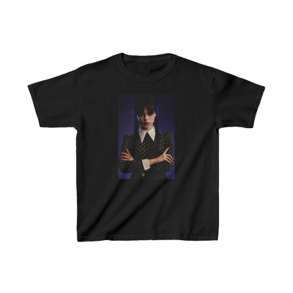 Child's 'Wednesday': Embrace the Dark Elegance! Graphic Unisex Tee Shirt featuring a striking image of a young girl in a gothic outfit, showcasing her dark charm and elegance.