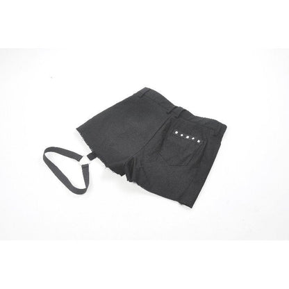 Elegant high-waisted black garter shorts featuring pleated asymmetrical panels and striking silver grommet accents, perfect for a sophisticated goth look.