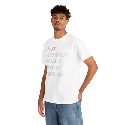 Model wearing a luxury white t-shirt with a humorous quote 'A LOT GOING ON MOSTLY NOT MY PROBLEM', styled with casual jeans for a sophisticated yet relaxed look.